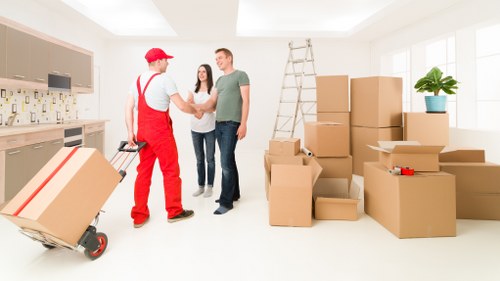 Careful loading of household items during removals in Westealing