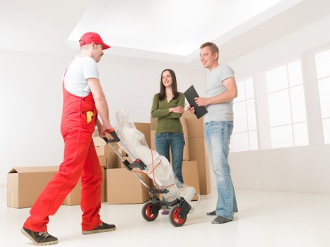 Packed boxes and furniture prepared for temporary storage
