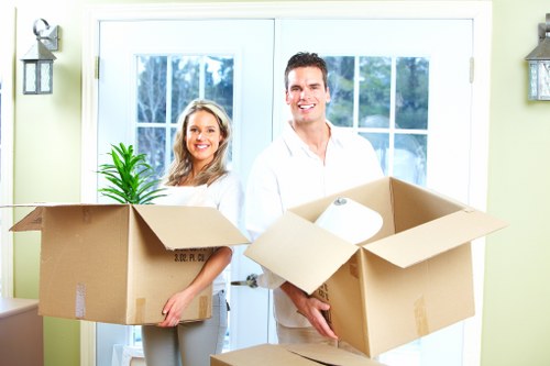 Apartment relocation service in Westealing with boxes and packed belongings